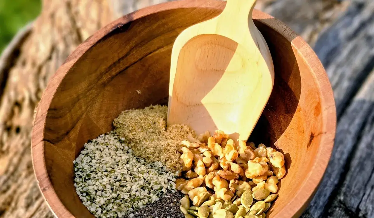 A bowl of kefir topped with Add Good Foods seed and nut mix